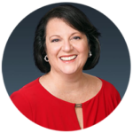 Headshot of Teri Kaye in a red blouse.